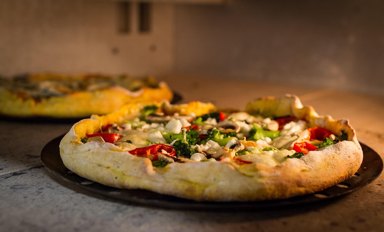 Pizza, oven, restaurant — How Does Dough Fermentation Affect Taste in Pinole-Style Pizzas?