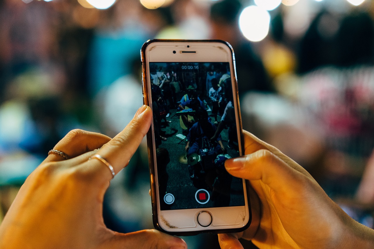Iphone, screen, taking photos — How To Increase Your Business Through Social Media?