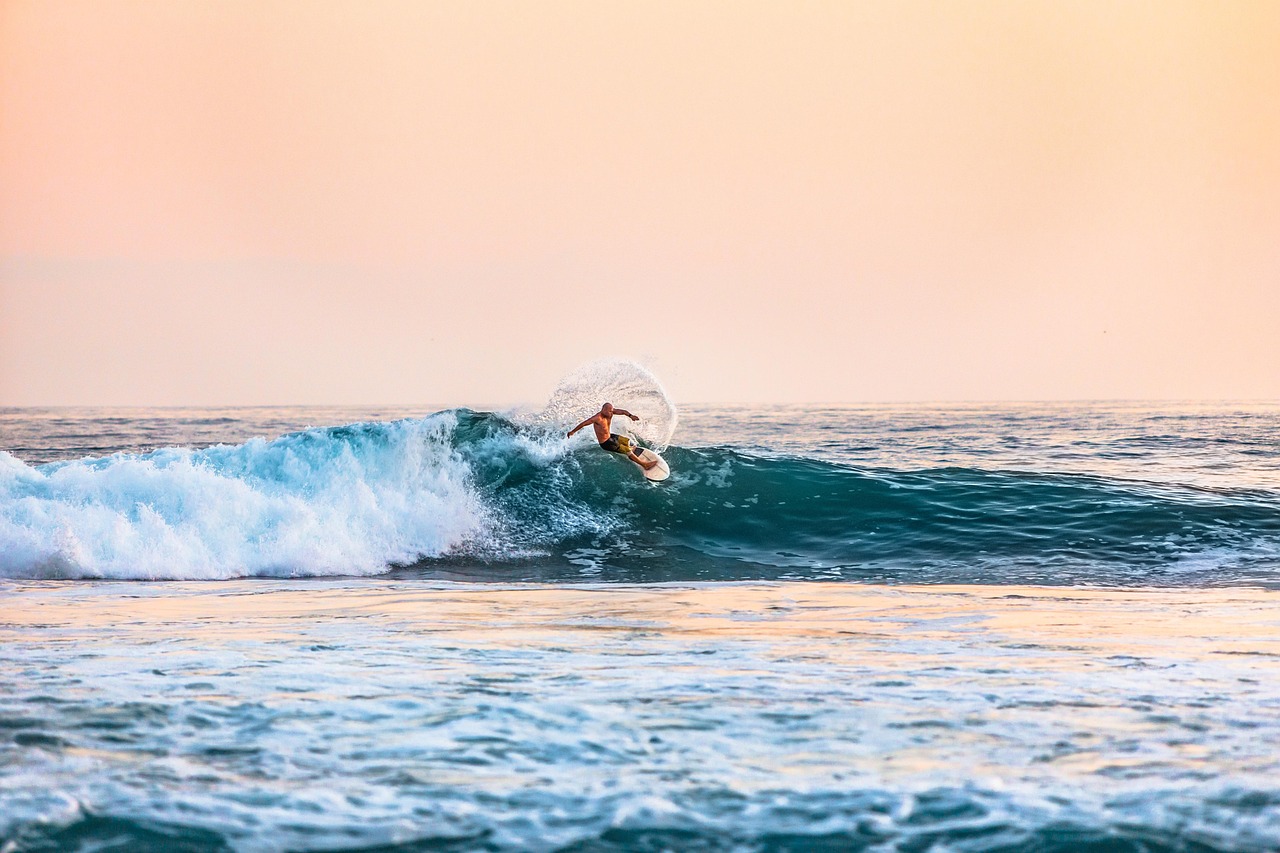 Surfer, beach, man — Stay Ahead in Sports News with La Grada Online